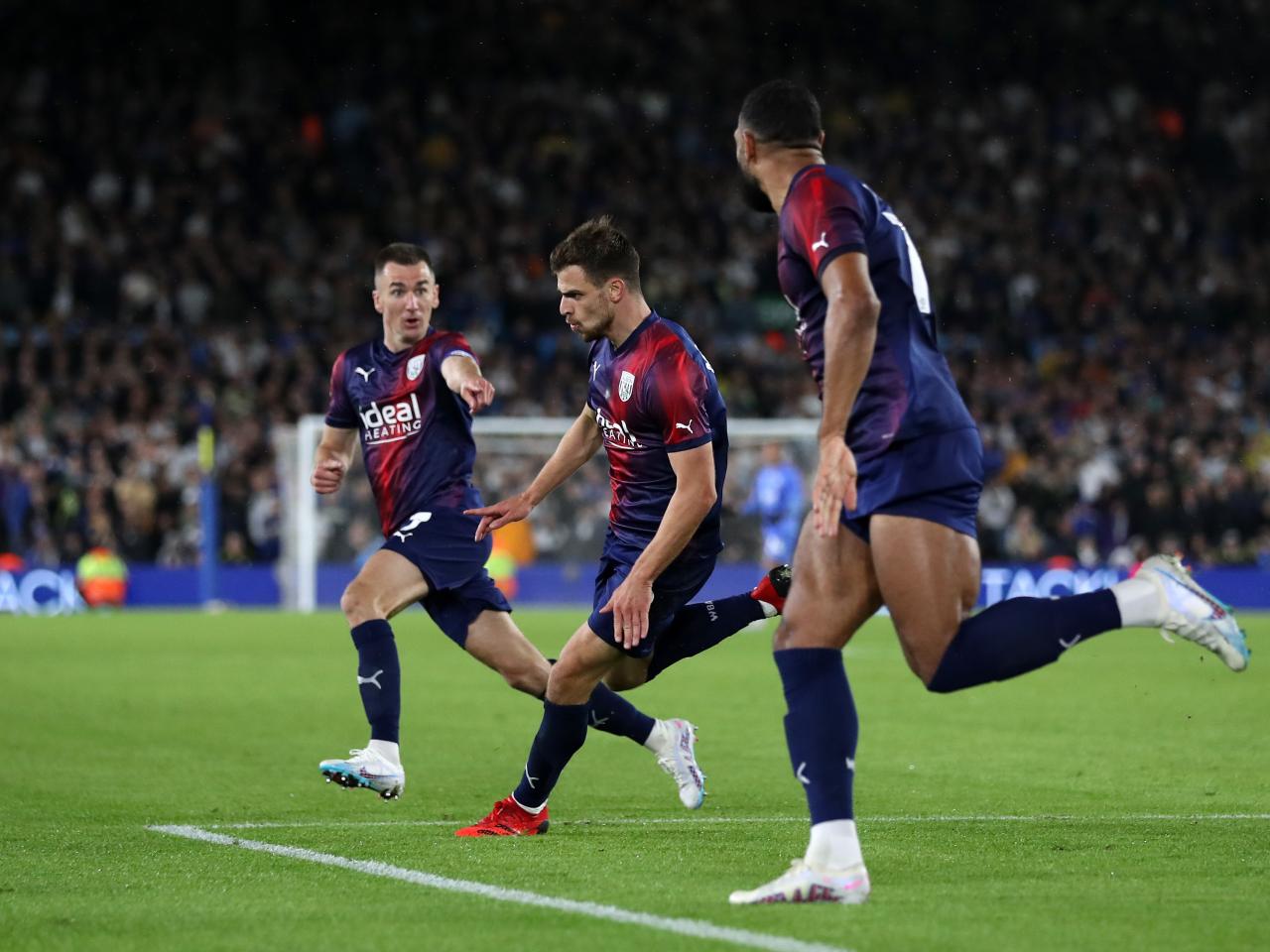 Jayson Molumby celebrates Albion's goal at Leeds