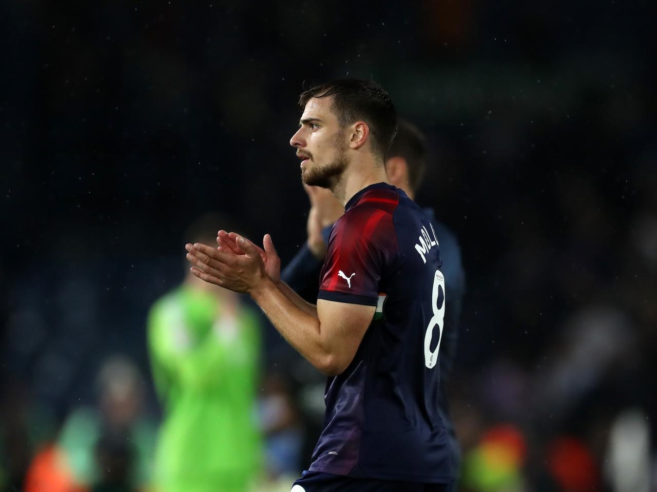 Jayson Molumby applauds the away fans at Elland Road