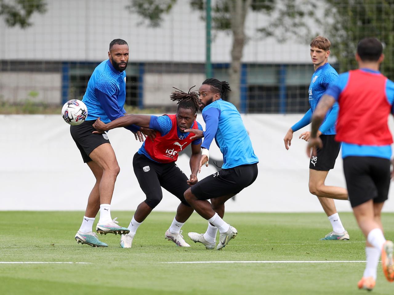 Brandon Thomas-Asante and Nathaniel Chalobah battle for the ball in training 
