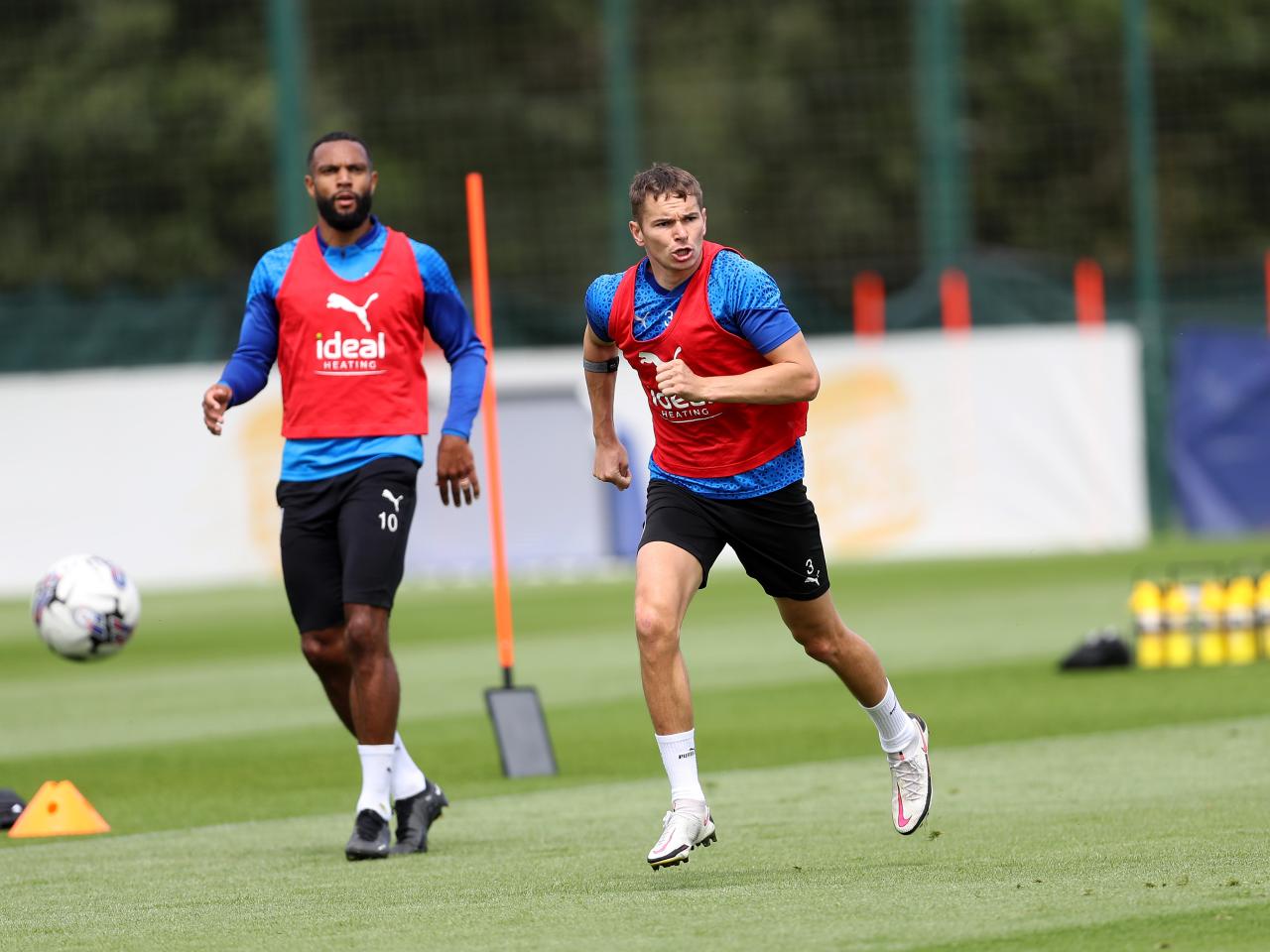 Conor Townsend runs forward in training 