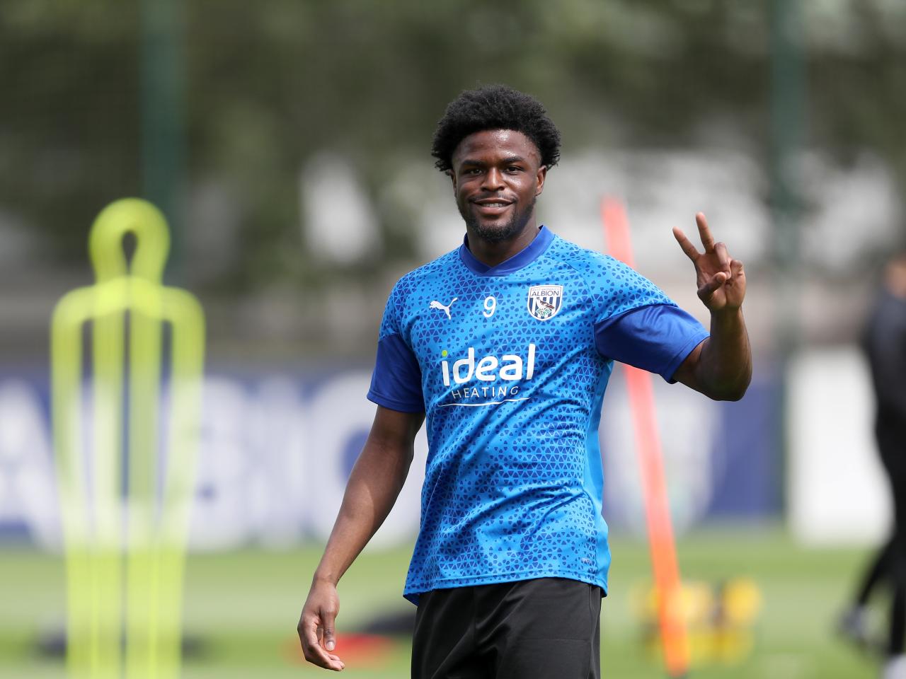 Josh Maja smiles at the camera during training 