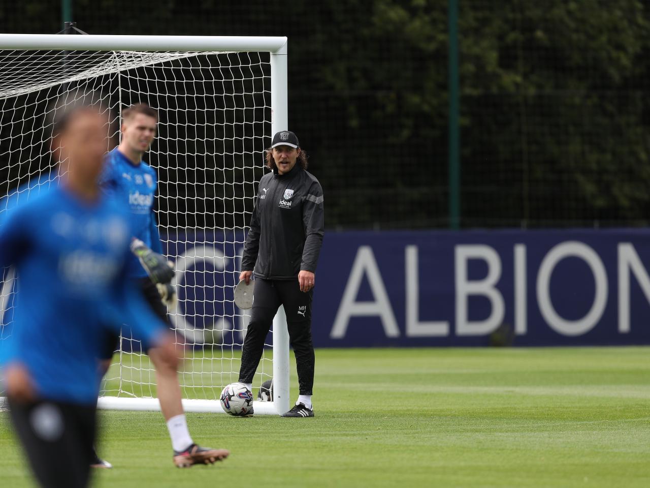 Michael Hefele watches training 