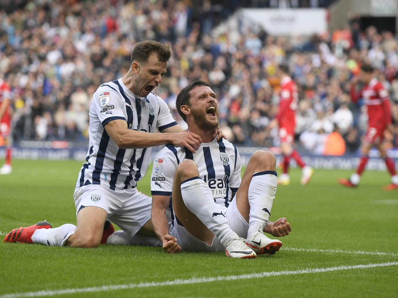 John Swift celebrates his goal against Middlesbrough with Jayson Molumby