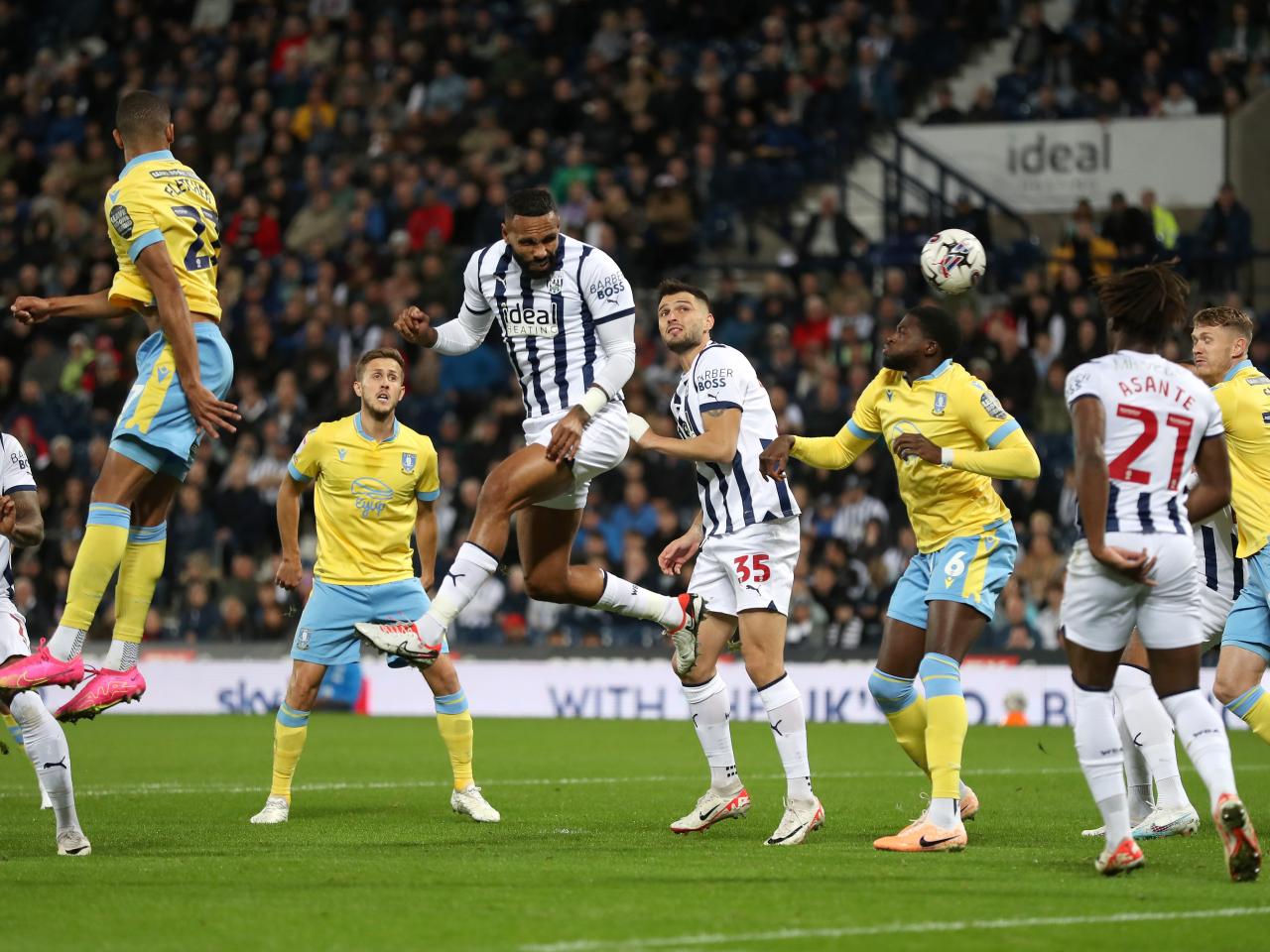 Kyle Bartley heading the ball from an attacking corner against Sheffield Wednesday