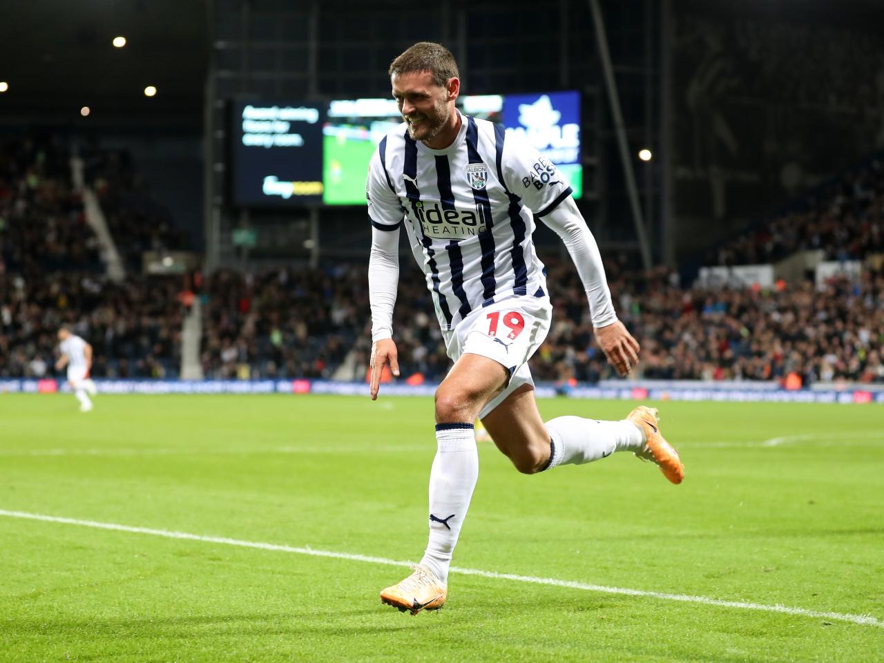 John Swift celebrates scoring against Sheffield Wednesday