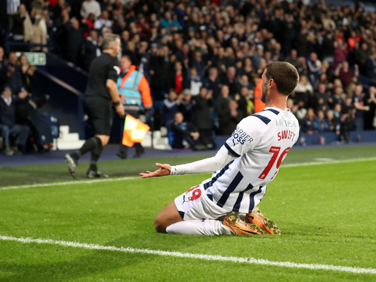 John Swift celebrates scoring against Sheffield Wednesday