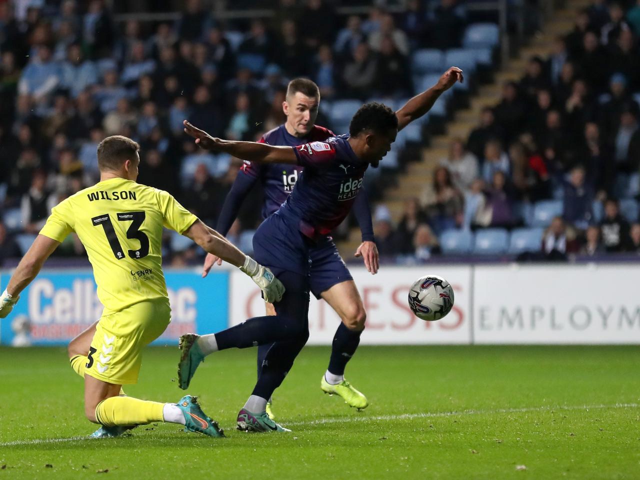 Grady Diangana gets ready to slot the ball into the net against Coventry