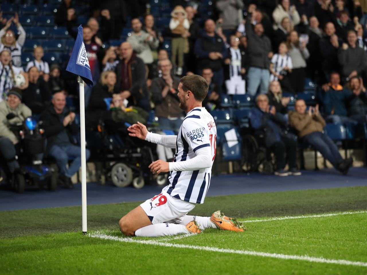 John Swift celebrates scoring against Sheffield Wednesday