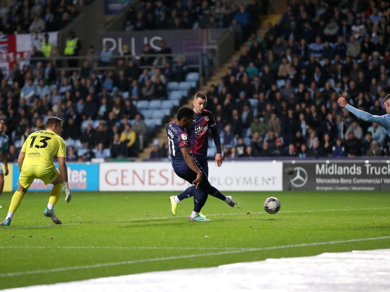 Grady Diangana slots the ball into the net against Coventry