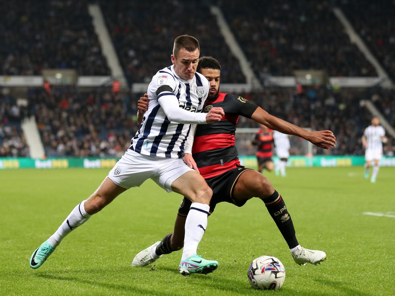 Jed Wallace battles for the ball
