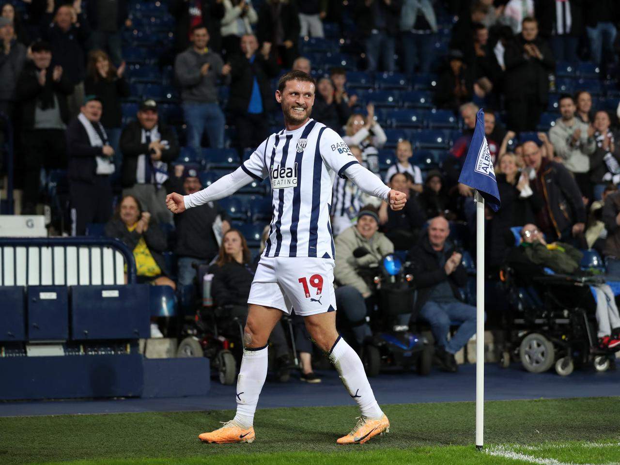 John Swift celebrates scoring against Sheffield Wednesday