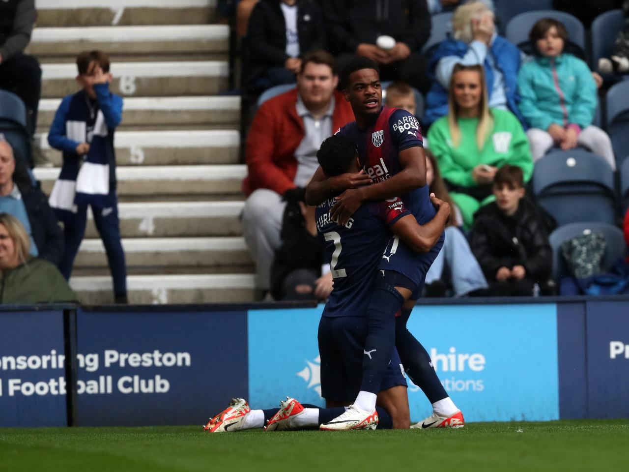 Darnell Furlong celebrates scoring against Preston with Grady Diangana