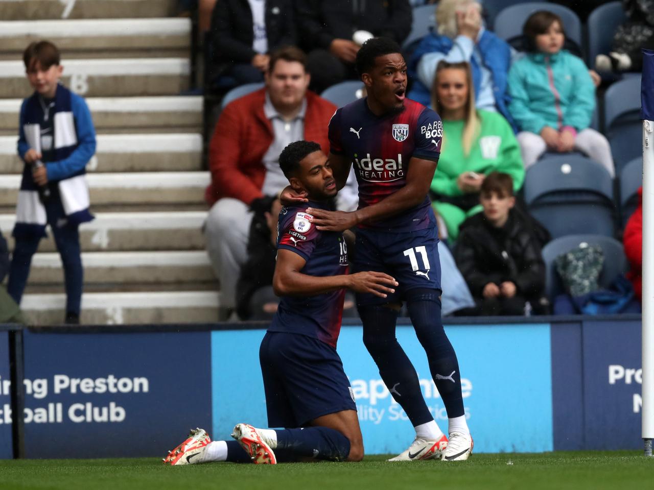 Darnell Furlong celebrates scoring against Preston with Grady Diangana