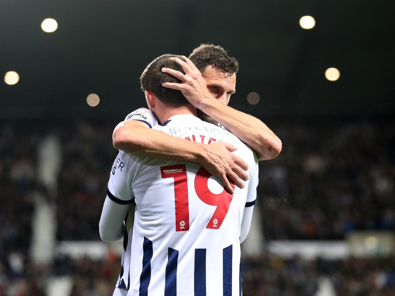 John Swift celebrates scoring against Sheffield Wednesday with Erik Pieters