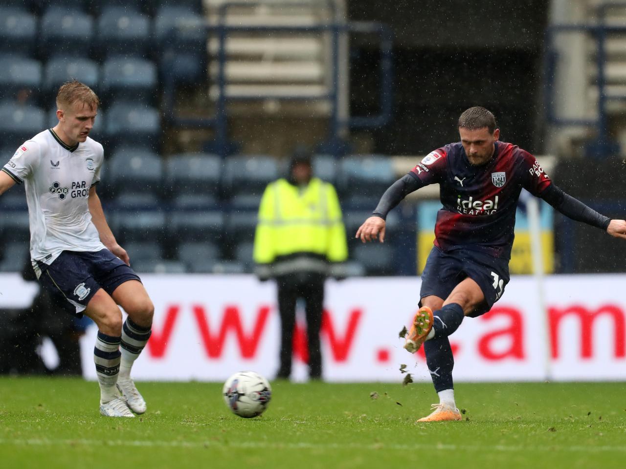 John Swift plays a pass against Preston