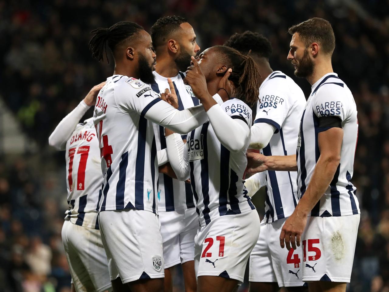 Brandon Thomas-Asante celebrates scoring against QPR with his team-mates