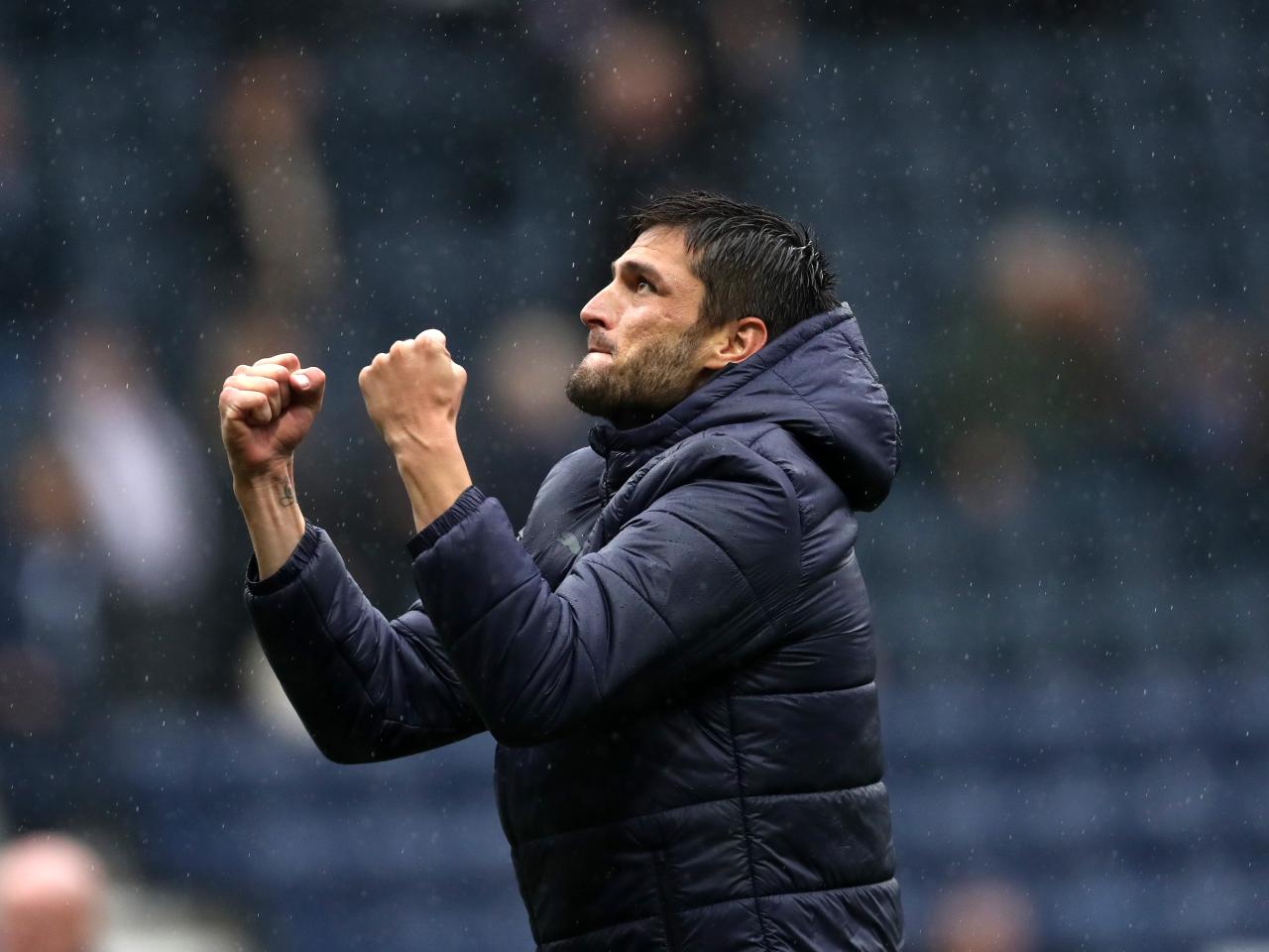 Okay Yokuslu celebrates at full time