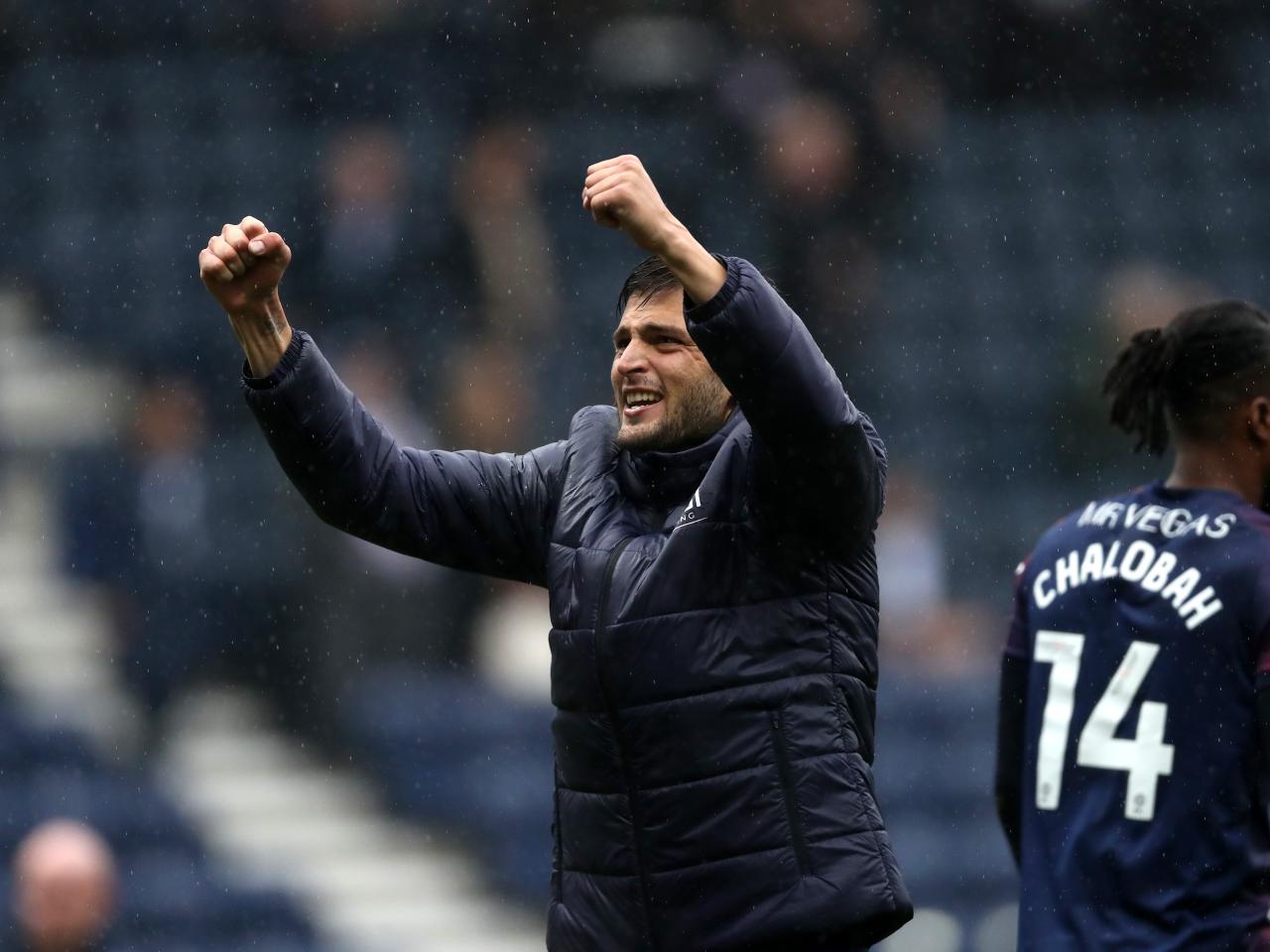 Okay Yokuslu celebrates at full time 