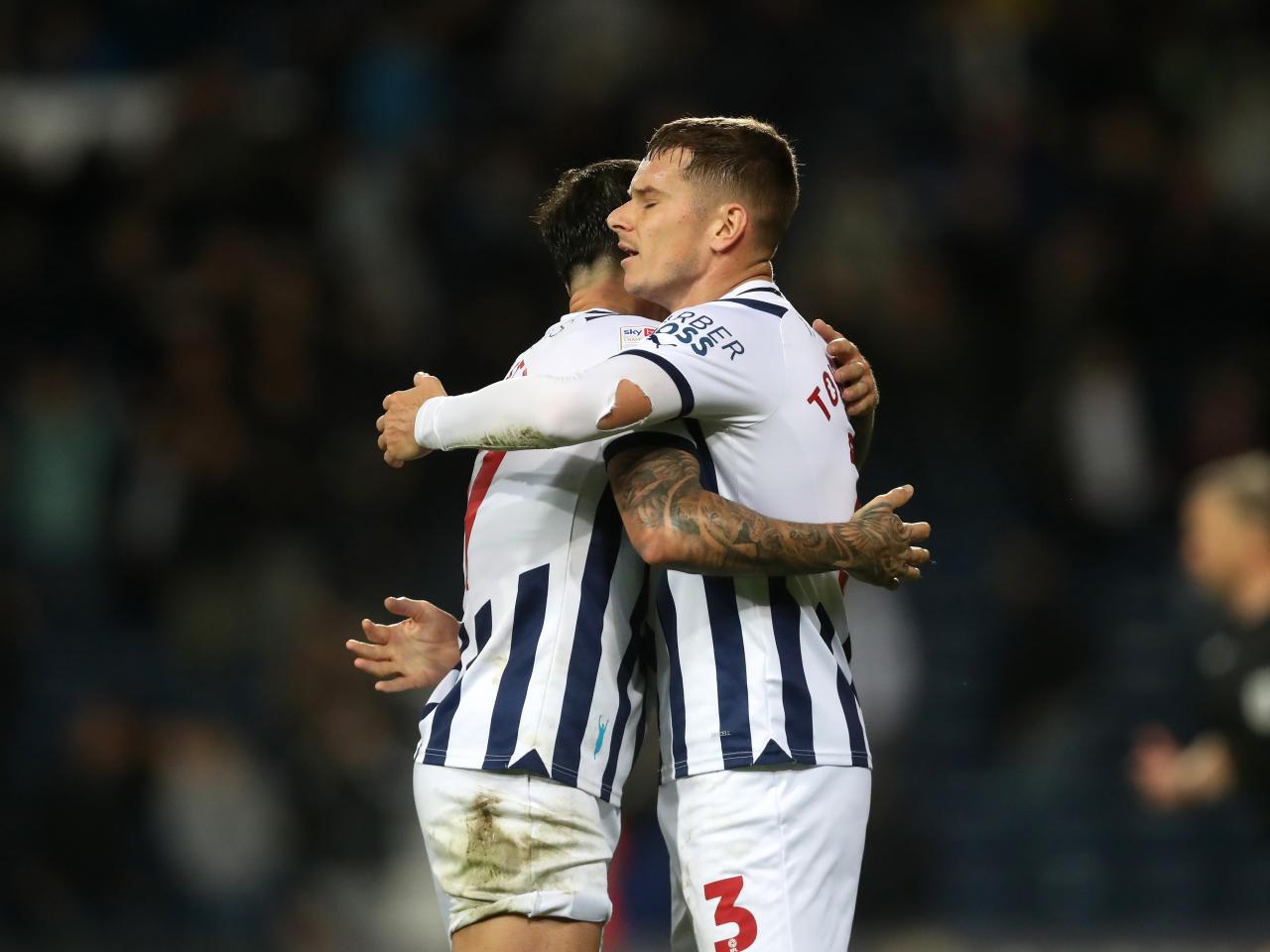 Conor Townsend and Alex Mowatt celebrate victory after the final whistle