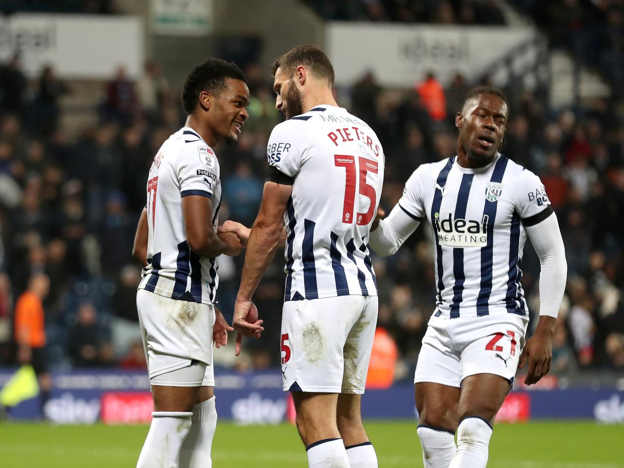 Grady Diangana celebrates scoring against QPR with his team-mates