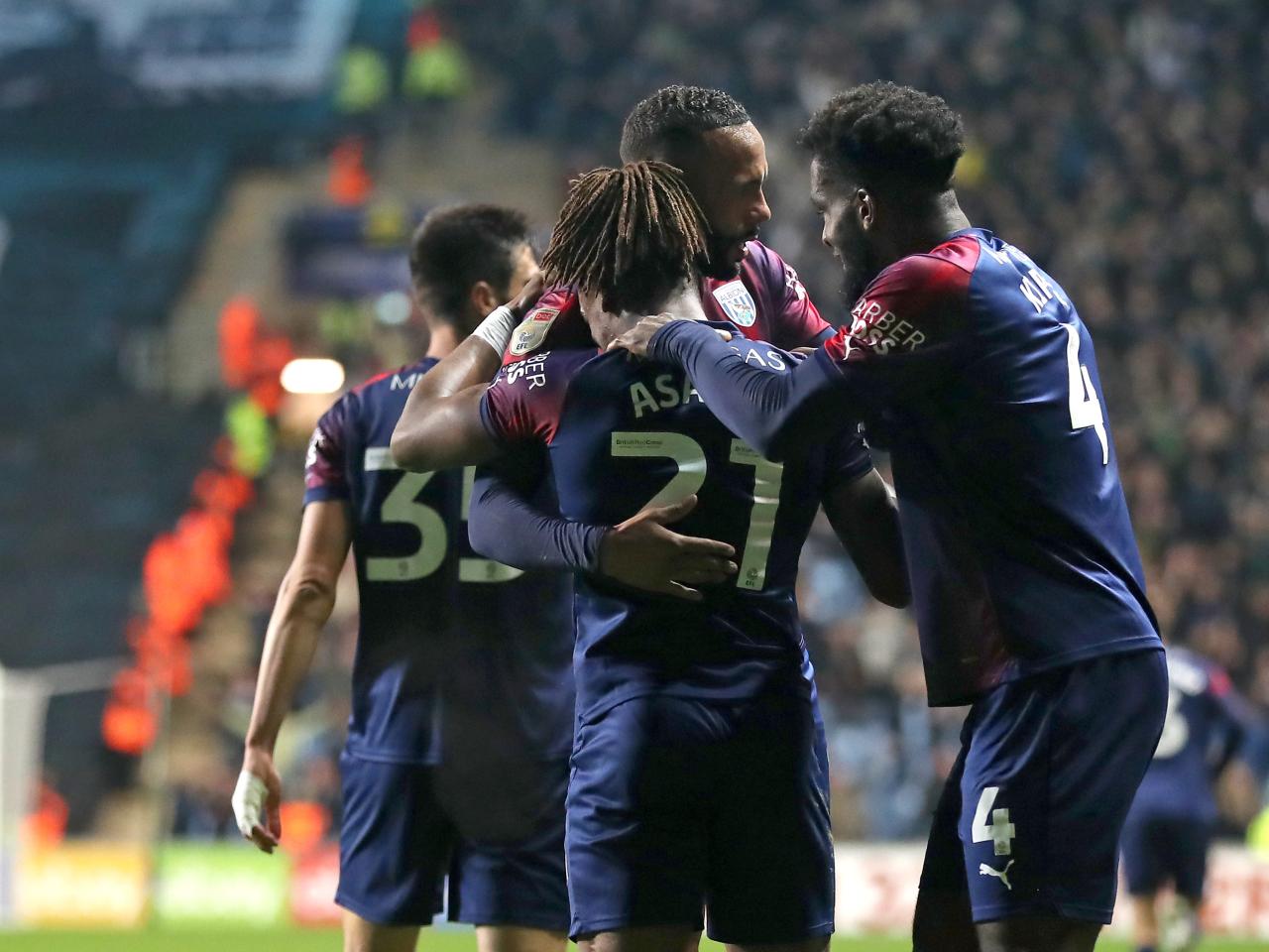 Brandon Thomas-Asante celebrates scoring against Coventry City with his team-mates