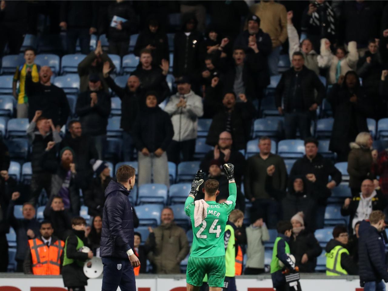 Alex Palmer celebrates winning at full-time