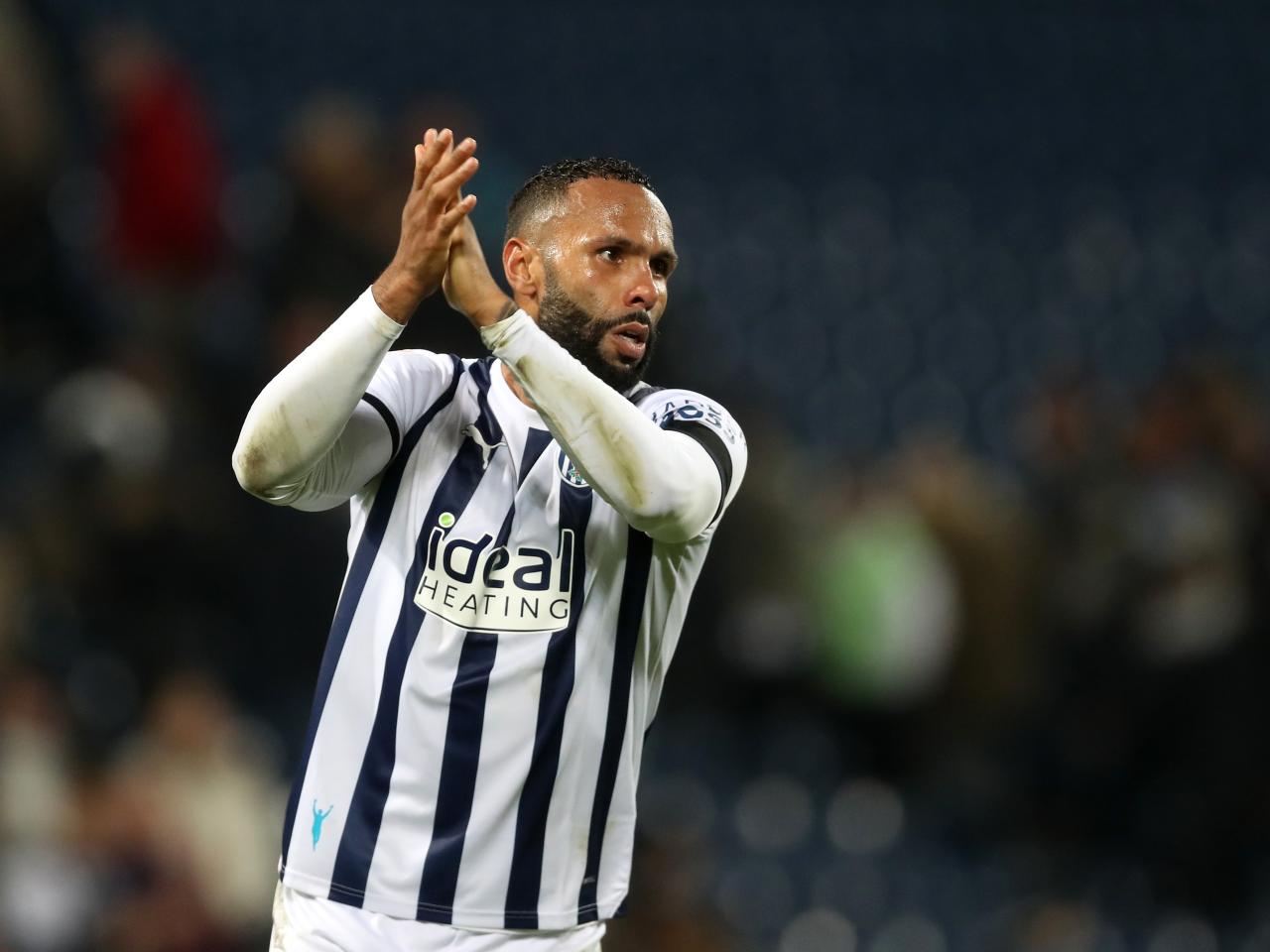 Kyle Bartley applauds supporters