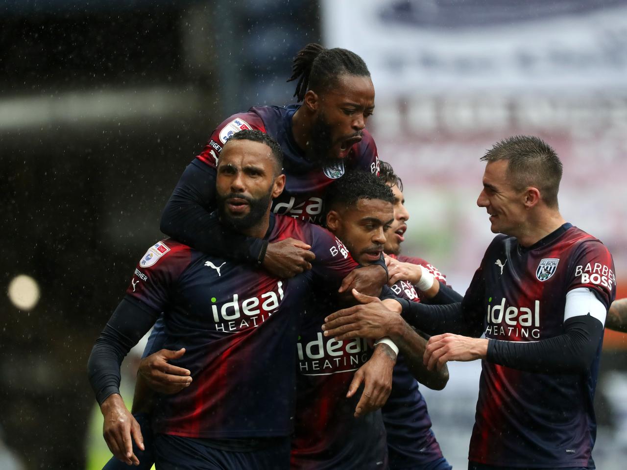 Kyle Bartley celebrates scoring against Preston with his team-mates