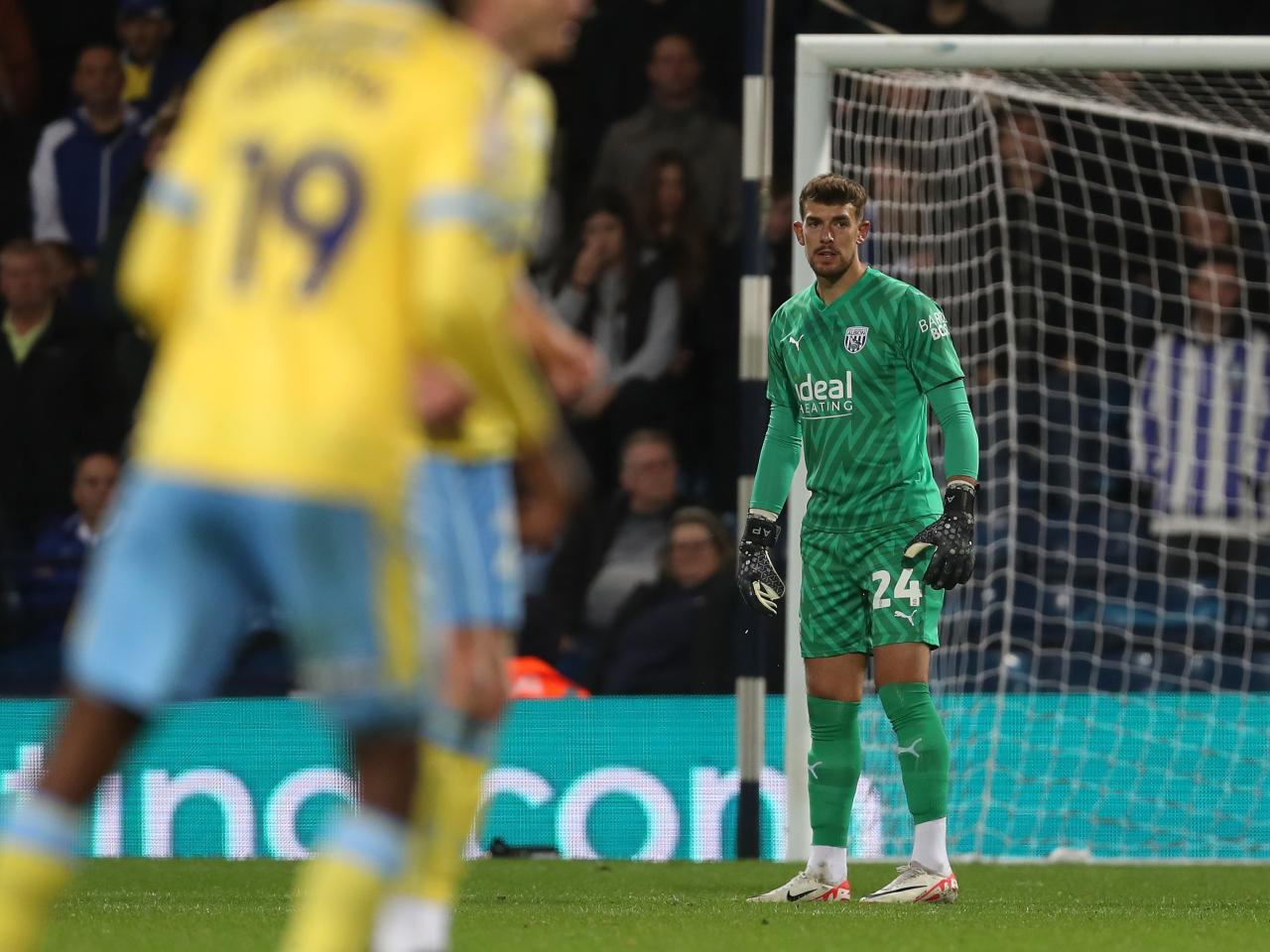 Alex Palmer watches on against Sheffield Wednesday