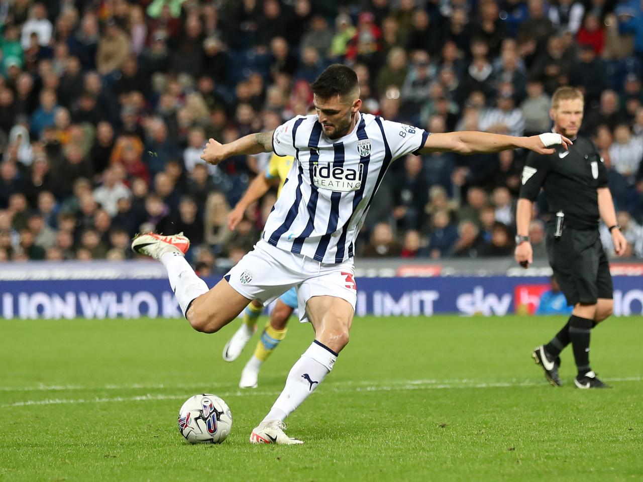 Okay Yokuslu shoots against Sheffield Wednesday