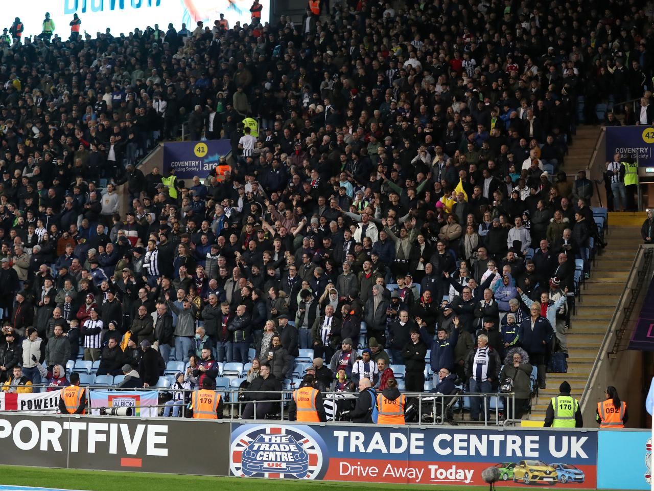 A large group of Albion fans in the away end at the CBS Arena