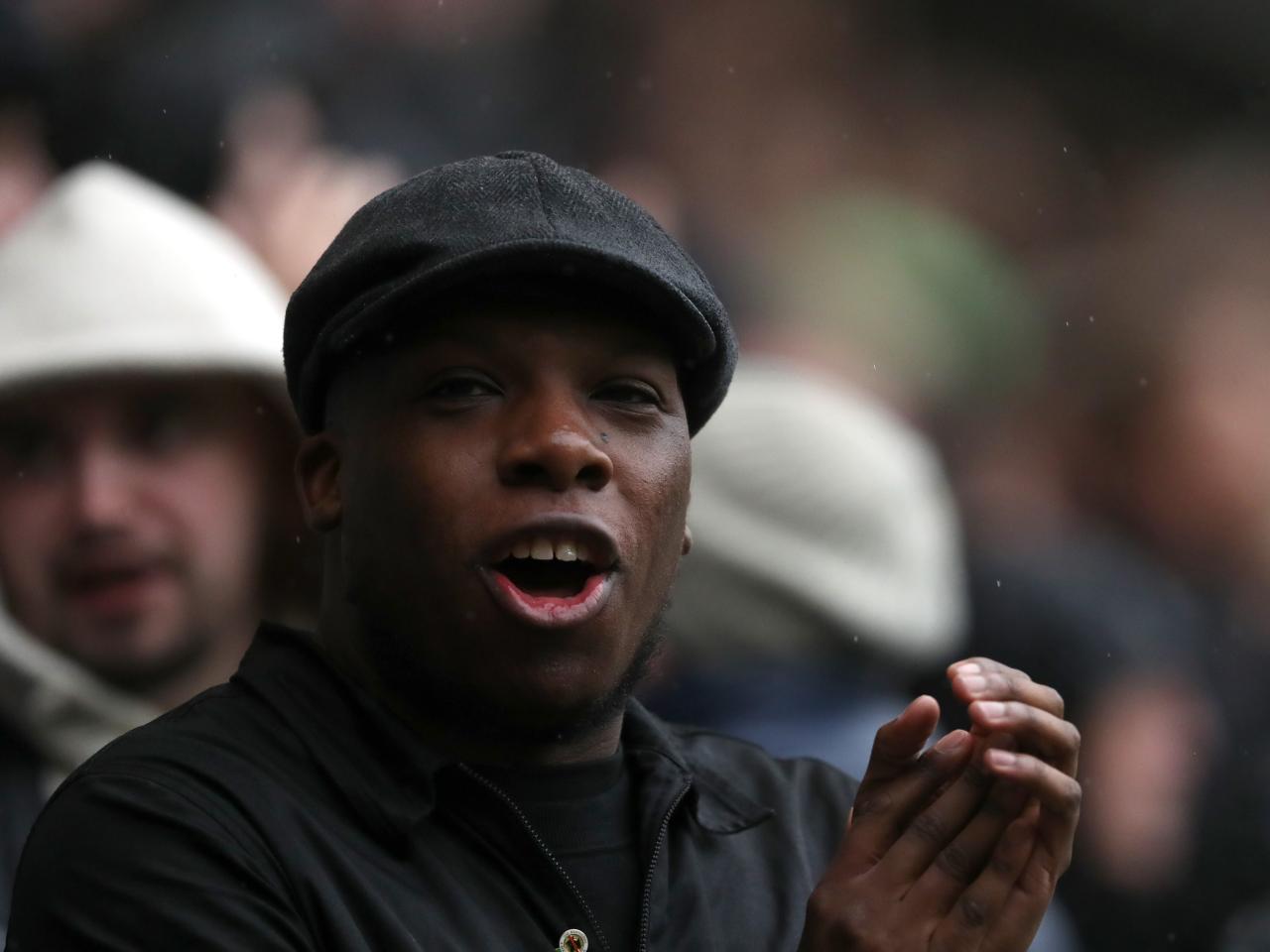 A male Albion fan in the away end at Preston