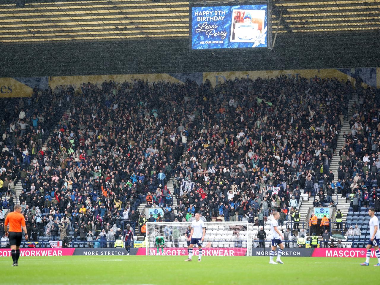 General view of Albion fans at Preston
