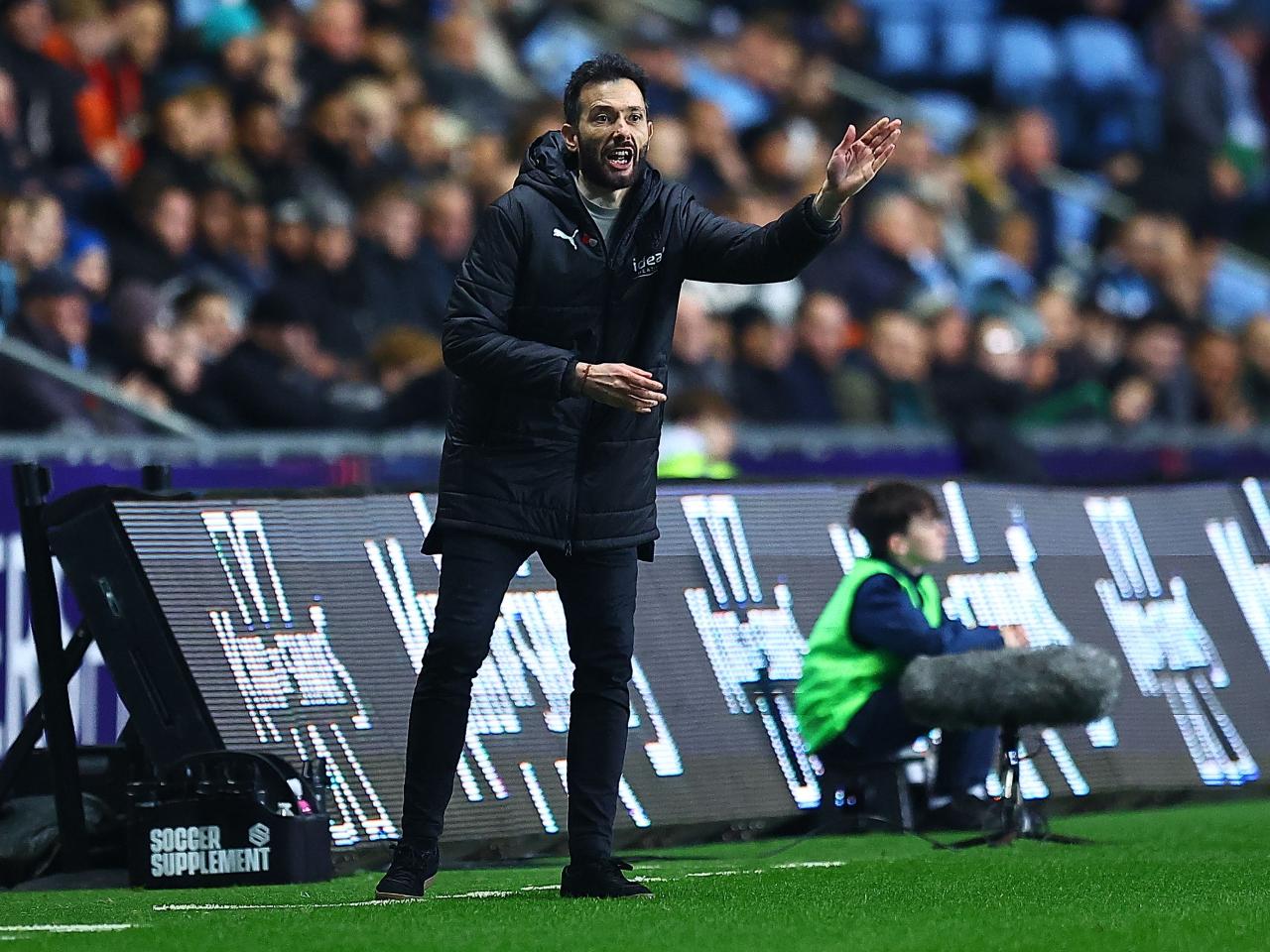 Carlos Corberán giving instructions on the side against Coventry City