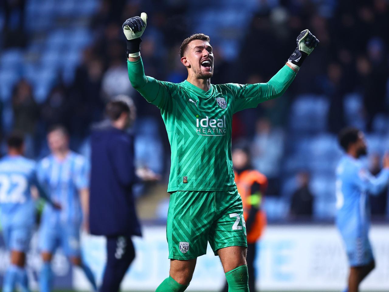 Alex Palmer celebrates winning at full-time