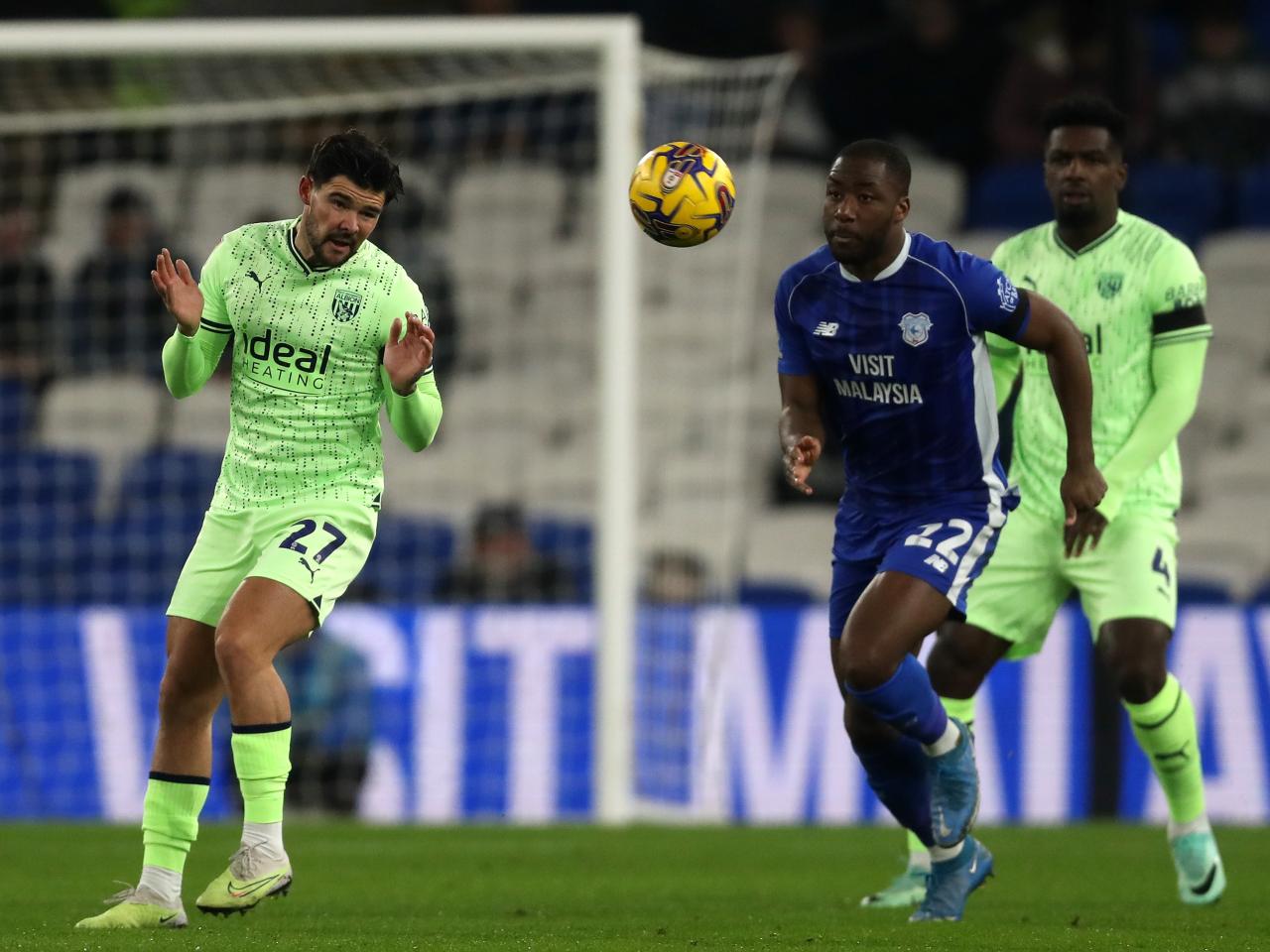 Alex Mowatt heads the ball against Cardiff 