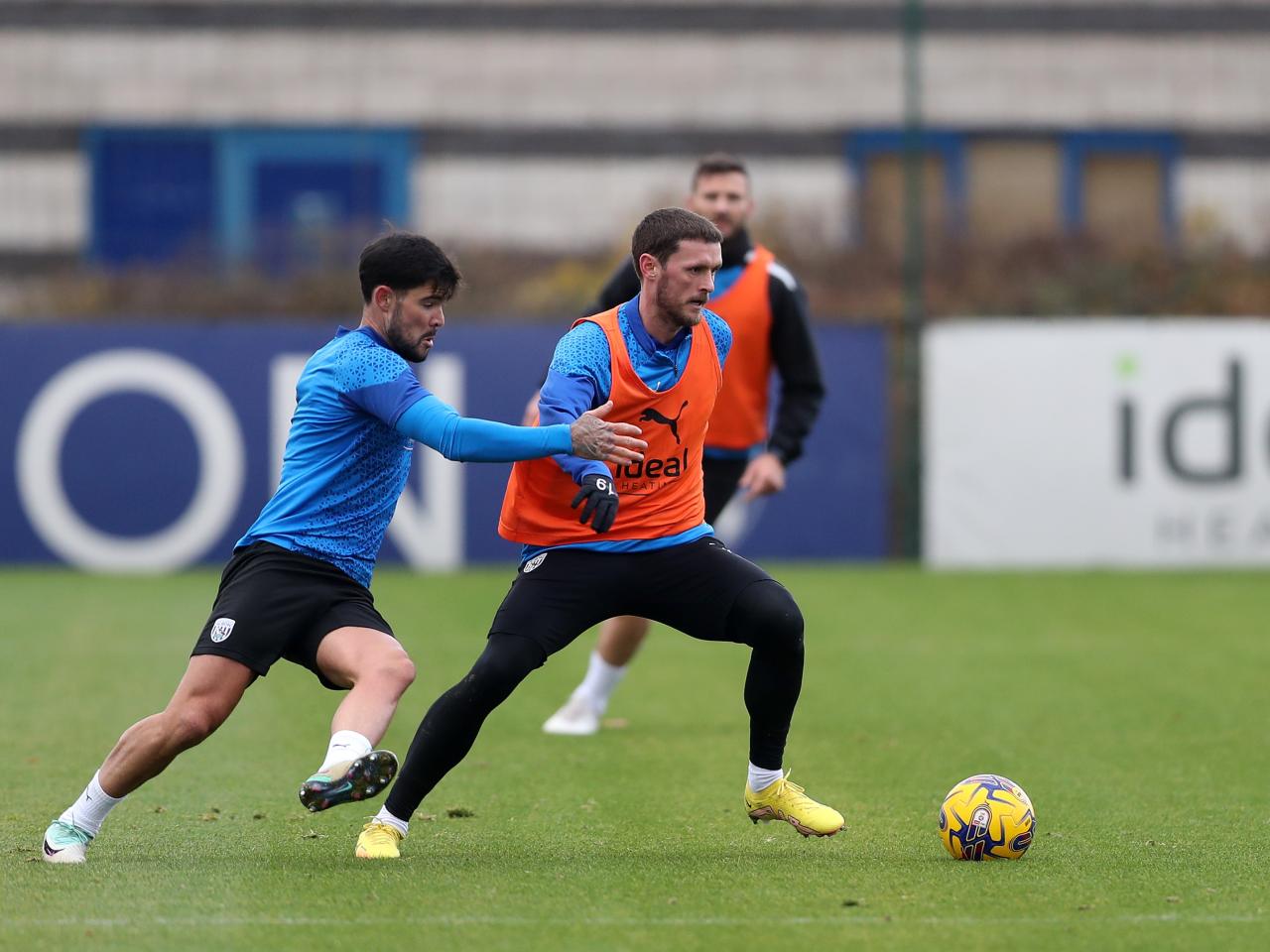 John Swift on the ball with Alex Mowatt behind him