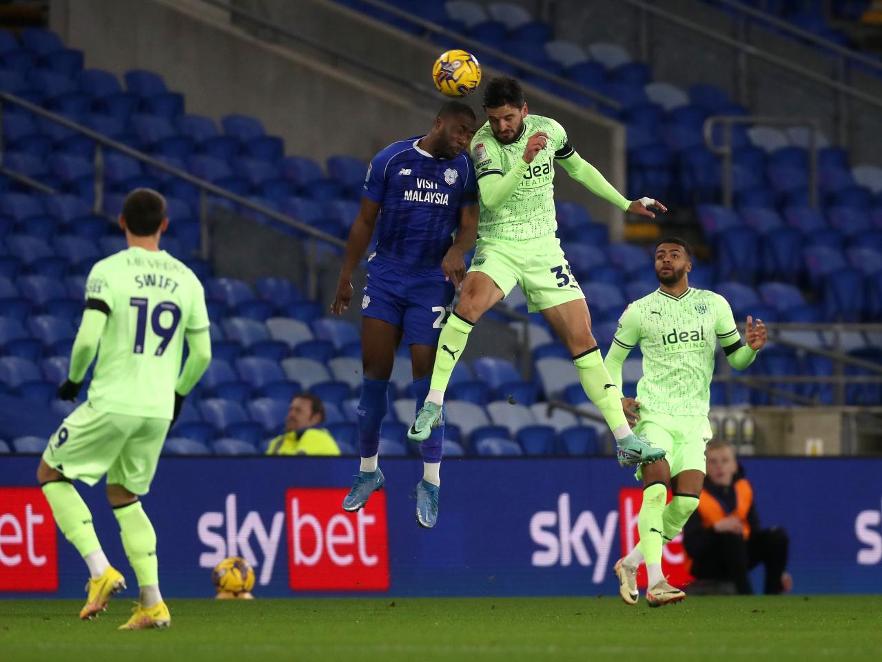 Cedric Kipre heading the ball against Cardiff