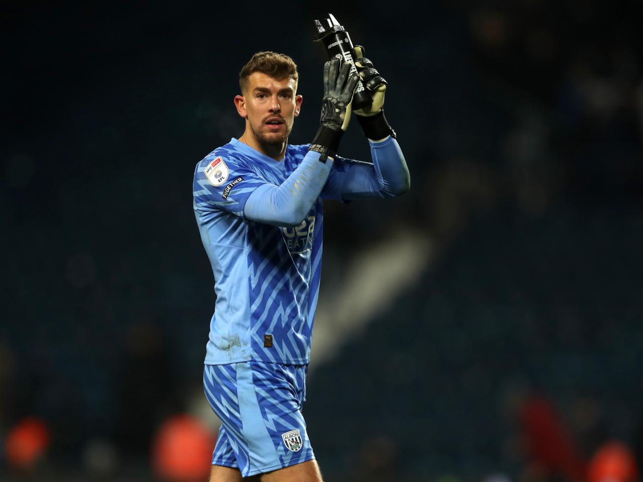 Alex Palmer applauds supporters at full-time against Ipswich 