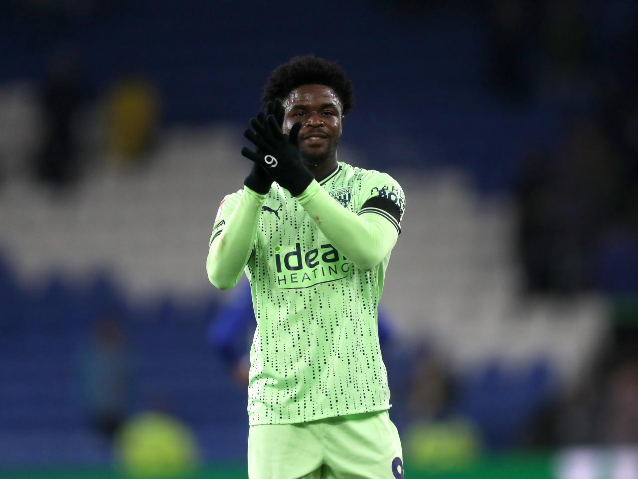 Josh Maja applauds the travelling fans at full-time