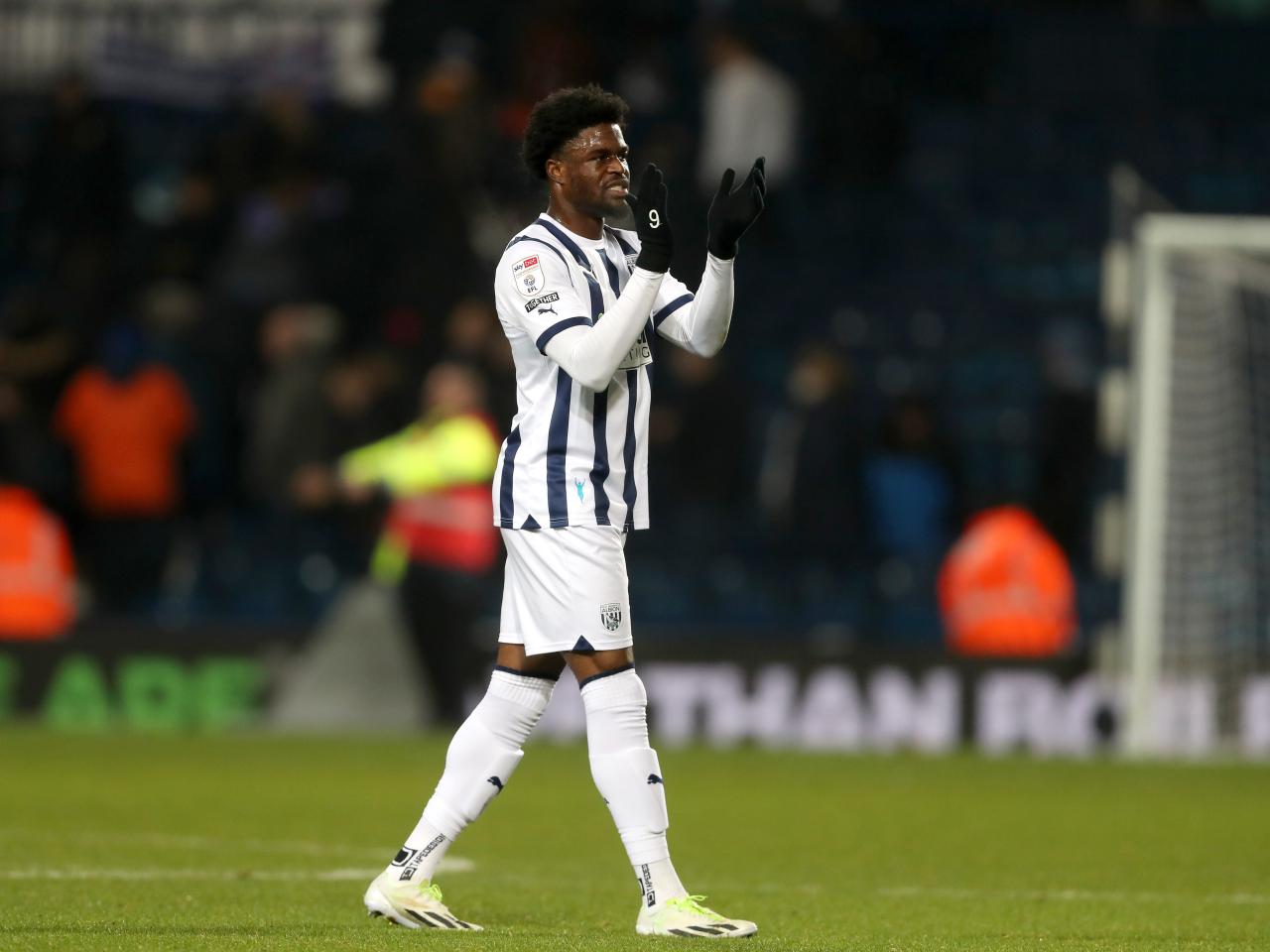 Josh Maja applauds supporters at full-time against Ipswich 