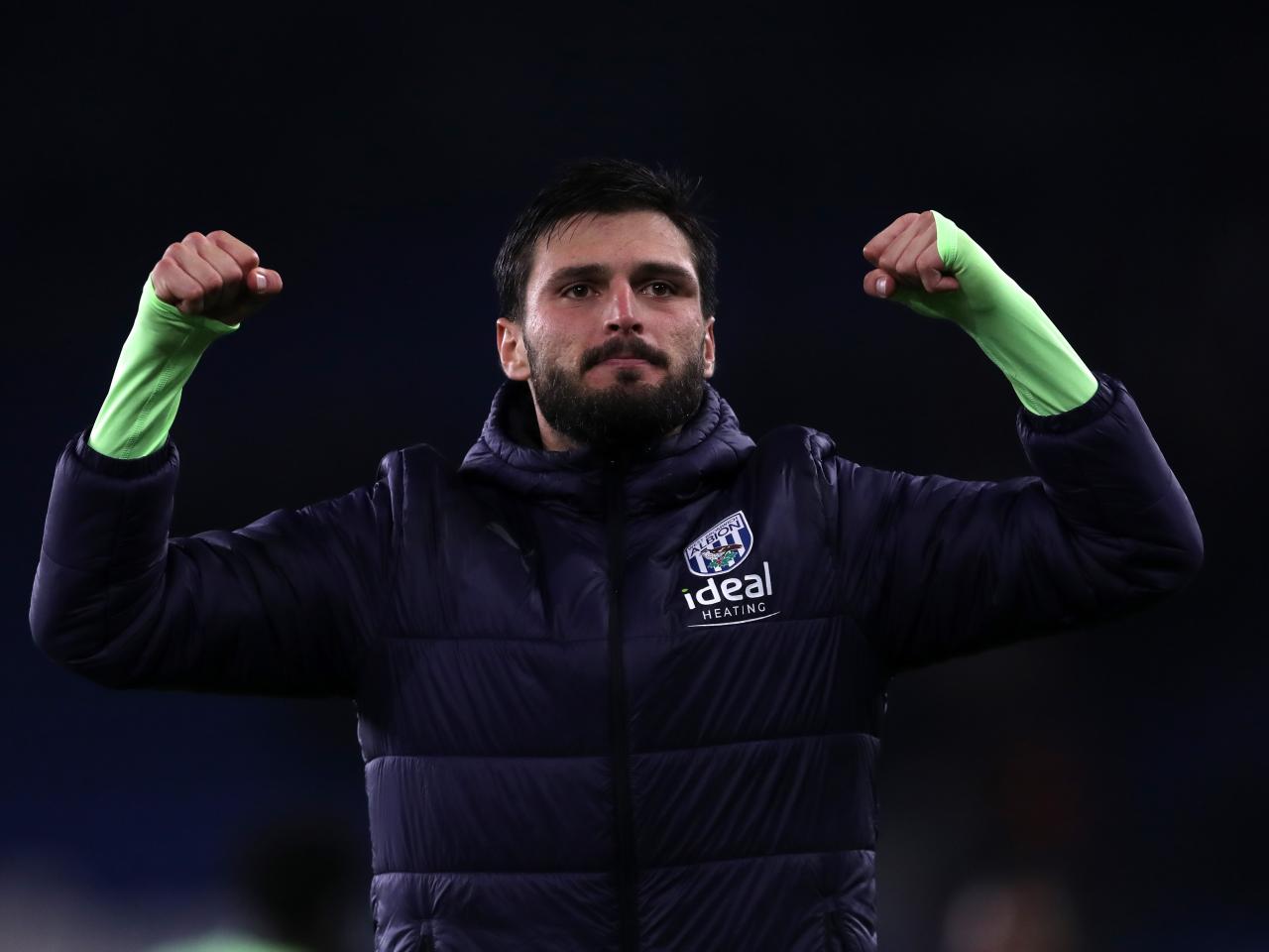 Okay Yokuslu applauds the travelling fans at full-time