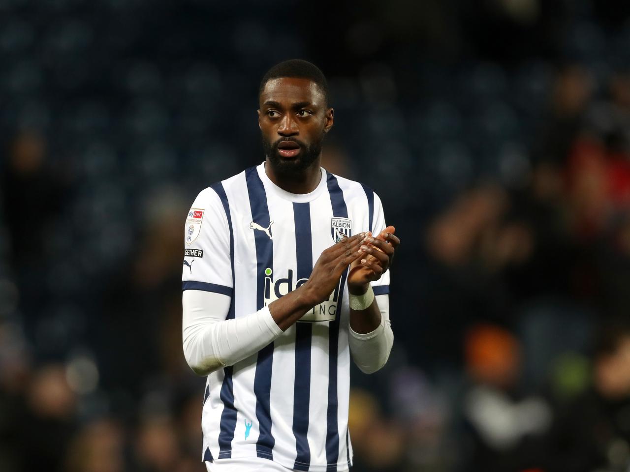 Semi Ajayi applauds supporters at full-time against Ipswich 