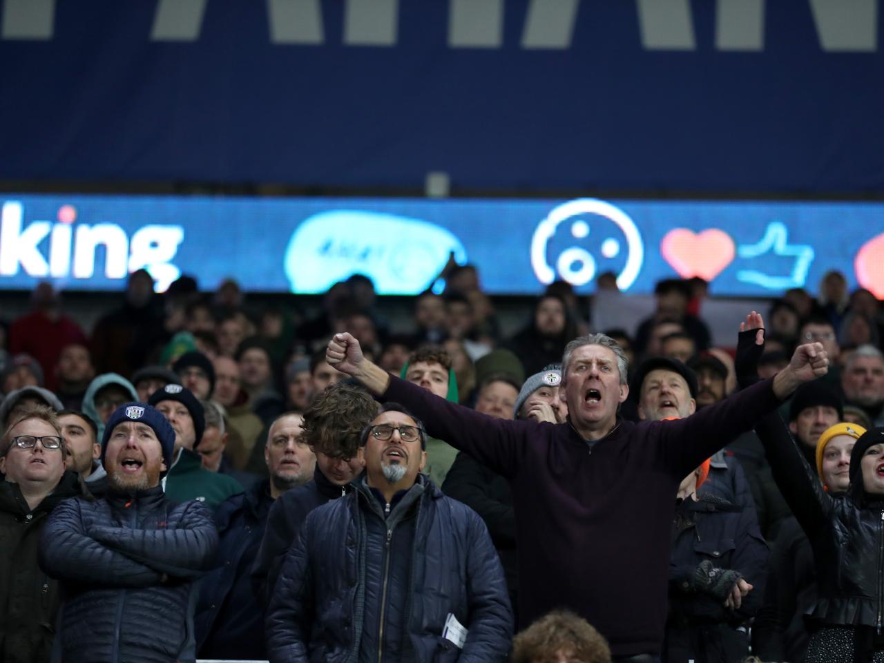 Albion supporters in the crowd at the Cardiff City Stadium