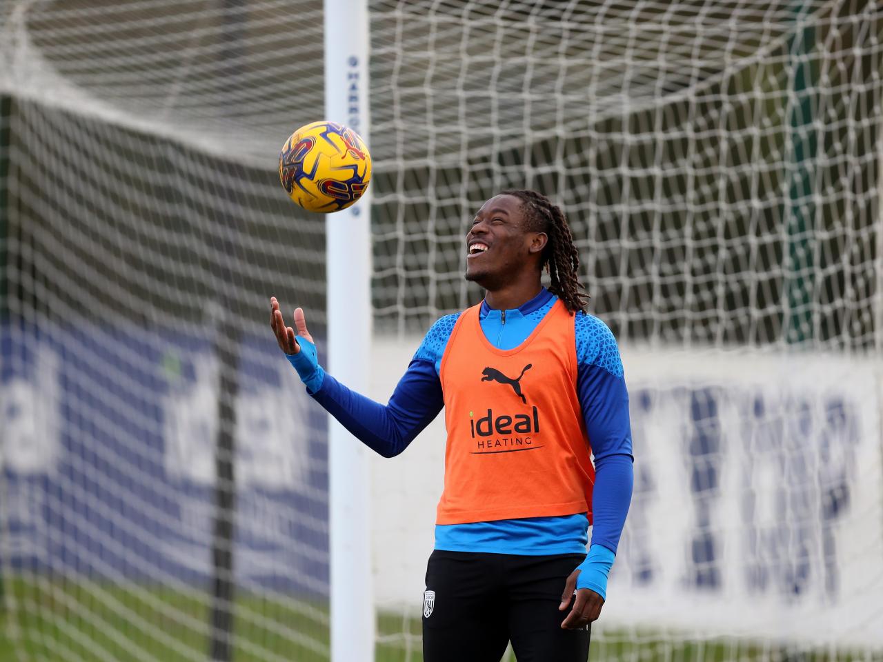 Brandon Thomas-Asante throwing a ball into the air