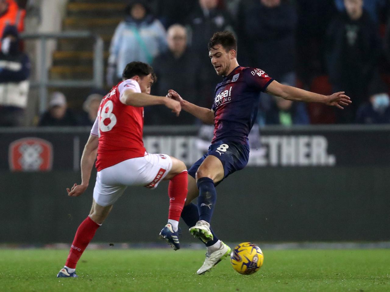 Jayson Molumby goes into a tackle against Rotherham