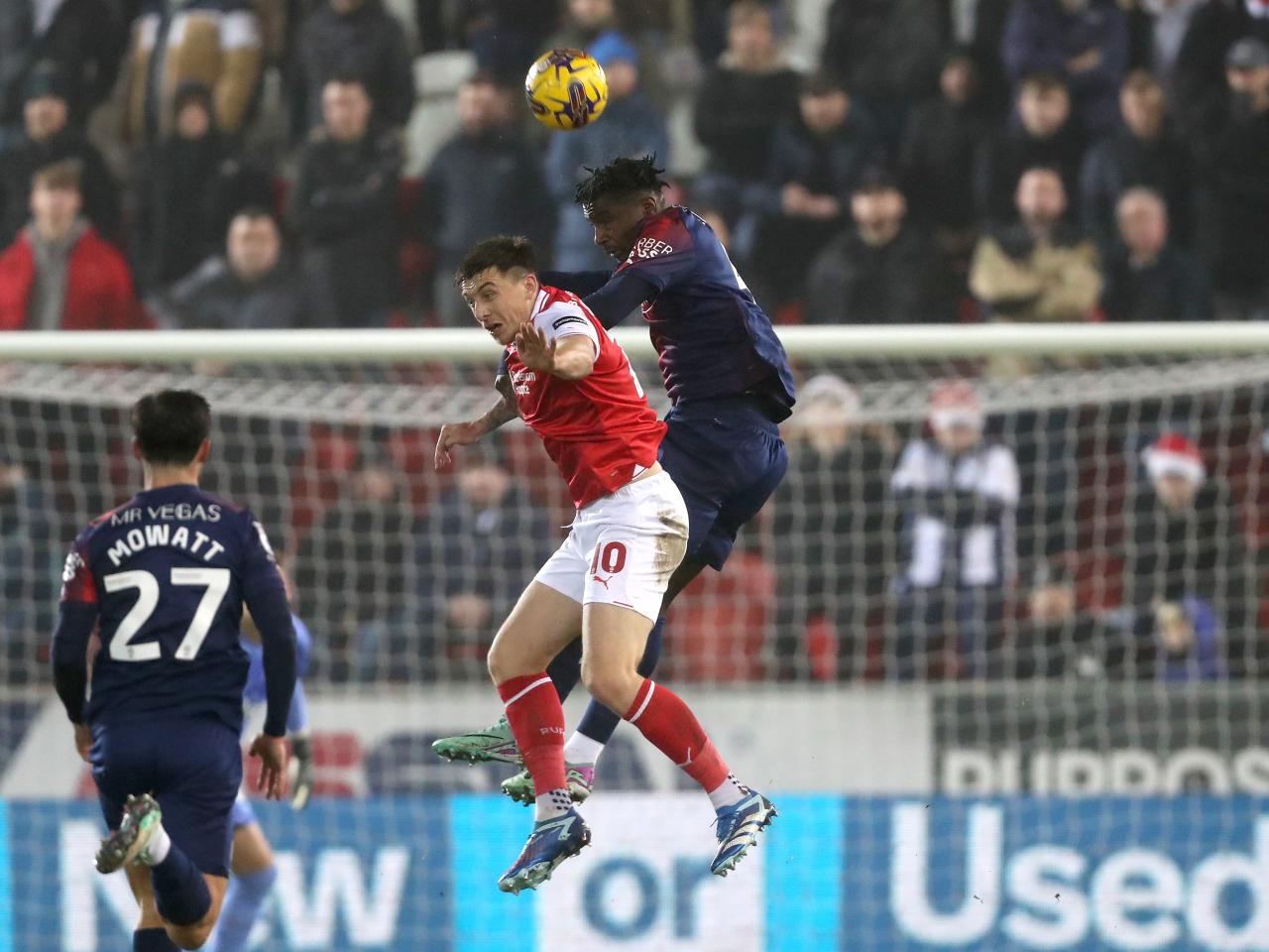 Cedric Kipre wins a header at Rotherham