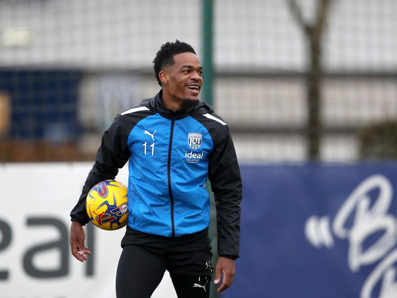 Grady Diangana smiling with the ball in his right hand