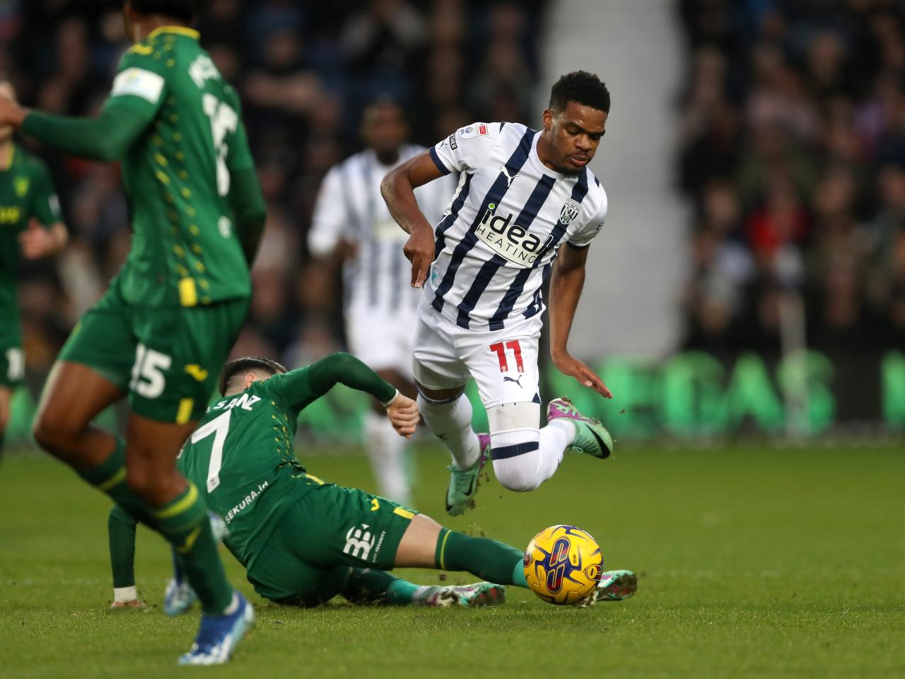 Grady Diangana is fouled by a Norwich City player