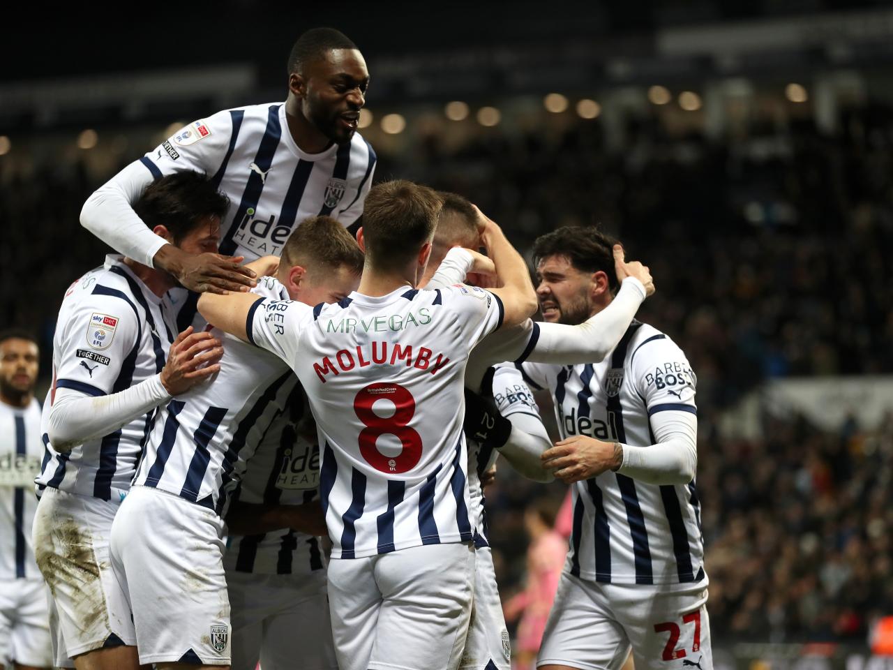 Grady Diangana celebrates scoring against Leeds with his team-mates